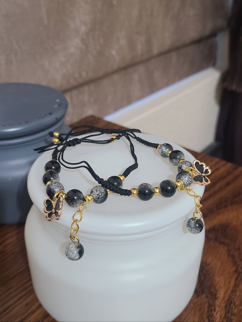Glass Black & Gray Beaded Bracelet with Gold Accents and Butterfly Charms